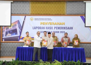 Pj. Sekdakab Lampung Tengah Hadiri Penyerahan LHP Semester II Tahun 2024 di BPK Perwakilan Provinsi Lampung